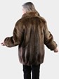 Woman's Natural Medium Tone Long Hair Beaver Jacket Reversing to Brown Leather