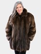 Woman's Natural Medium Tone Long Hair Beaver Jacket Reversing to Brown Leather